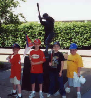 Tyler and friends in front of Busch Stadium statue